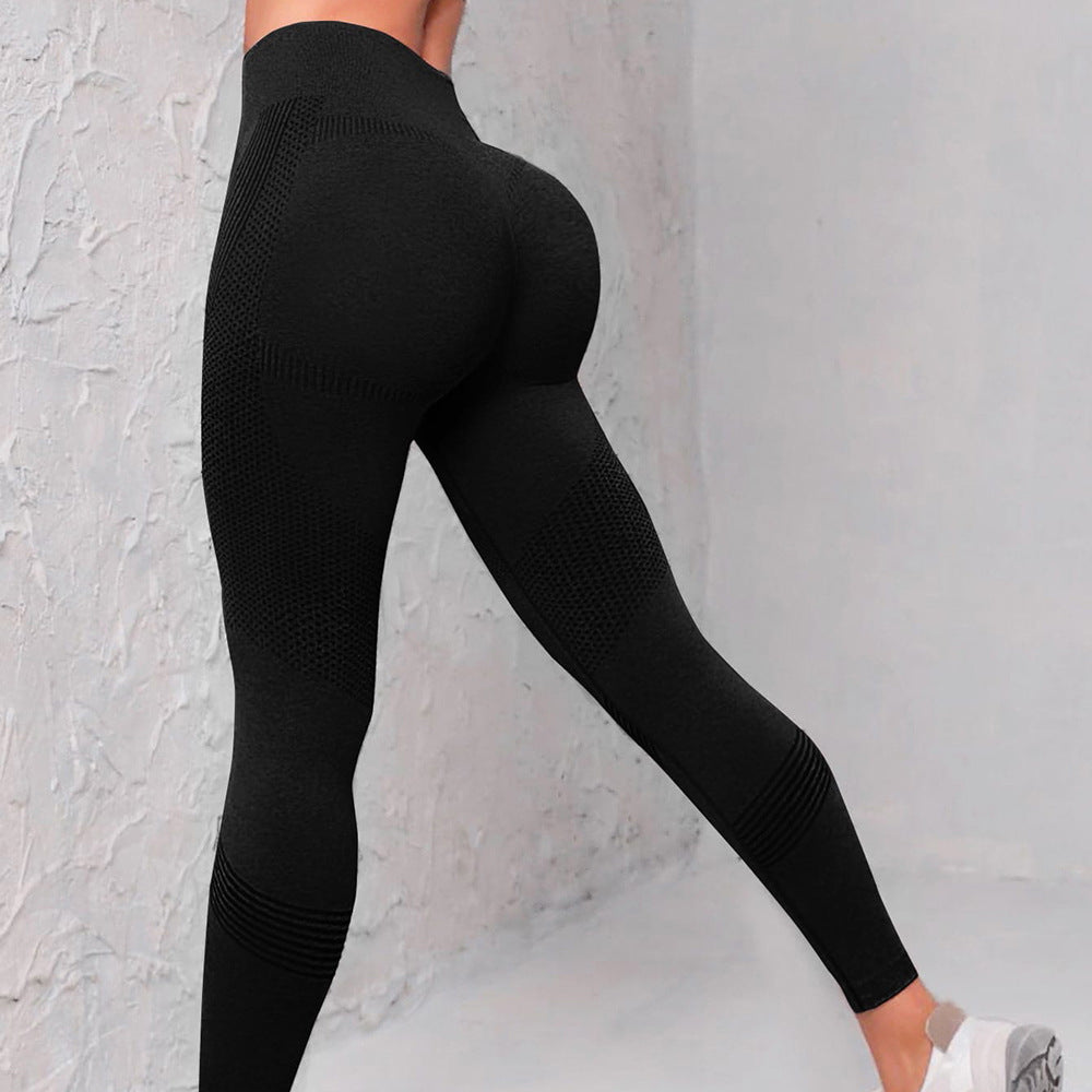 High waist seamless yoga pants with dot and striped print, designed to lift the butt and offer a flattering fit for women during workouts.