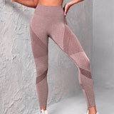 High waist seamless yoga pants with dot and striped print, designed to lift the butt and offer a flattering fit for women during workouts.