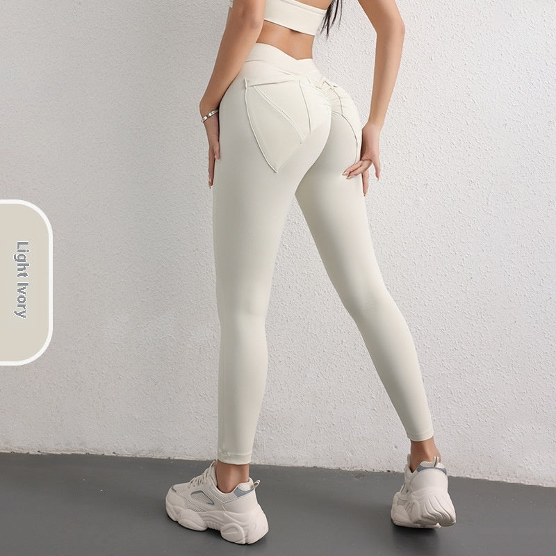 Nude feel high waist hip lift yoga pants for women, designed for sports and fitness with a flattering, curve-enhancing fit.